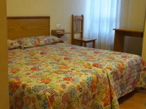 Postel nebo postele na pokoji v ubytování Hostal Orejas