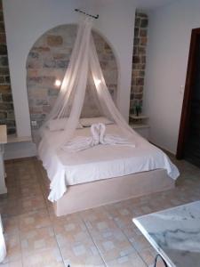 Posteľ alebo postele v izbe v ubytovaní Naxos Summerland resort