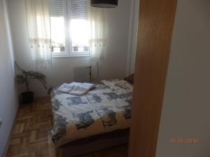Giường trong phòng chung tại Apartment Erika