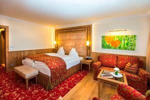 Ένα ή περισσότερα κρεβάτια σε δωμάτιο στο Hotel Hubertushof