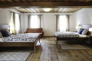 En eller flere senger på et rom på Ferienwohnung Moarhofer