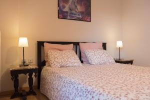A bed or beds in a room at Διαμέρισμα 65 τμ στην καρδιά της πόλης