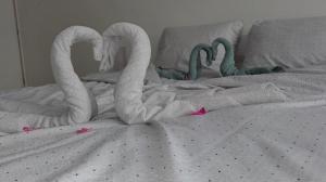 Ein Bett oder Betten in einem Zimmer der Unterkunft Apartment Dixy