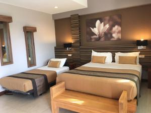 Hotel Colibri客房内的一张或多张床位