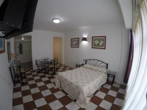 מסעדה או מקום אחר לאכול בו ב-Apartamentos Hotel Avilla