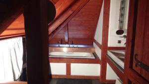 a bathroom with a sink in an attic at 14 Century Water Mill in Mořina +8 photos