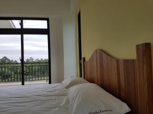 Postel nebo postele na pokoji v ubytování Taroko Formosa Homestay