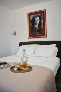 Ένα ή περισσότερα κρεβάτια σε δωμάτιο στο Apartmani Ognjanovic Kotor