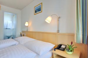 Voodi või voodid majutusasutuse Hotel Alpenruh toas
