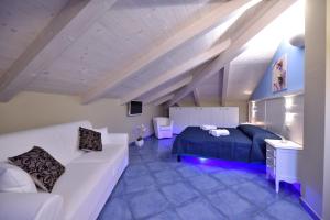 Postel nebo postele na pokoji v ubytování Residenza Vinci Room & Suite