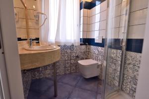 Koupelna v ubytování Residenza Vinci Room & Suite