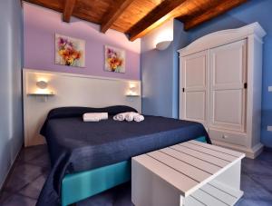 Postel nebo postele na pokoji v ubytování Residenza Vinci Room & Suite