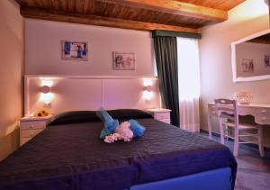 Postel nebo postele na pokoji v ubytování Residenza Vinci Room & Suite