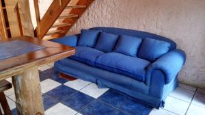 Ein Sitzbereich in der Unterkunft Algarrobo Suites