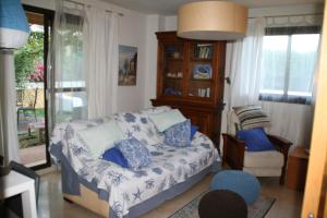 a living room with a couch and a chair at You & Me in Jávea +45 photos