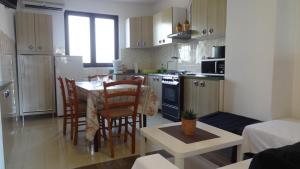 Kuchyňa alebo kuchynka v ubytovaní House Marcone - pool