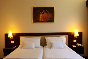 Postel nebo postele na pokoji v ubytování Hotel Sao Jose