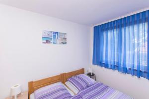 Posteľ alebo postele v izbe v ubytovaní House Iva
