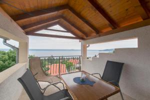 Balkón alebo terasa v ubytovaní House Iva