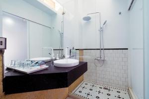 Kupaonica u objektu With Inn Hostel