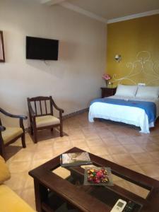 Posteľ alebo postele v izbe v ubytovaní Hotel Rural Andalucia