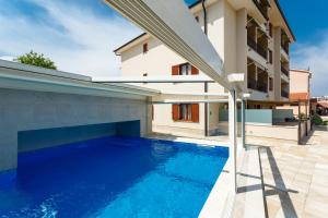 Swimmingpoolen hos eller tæt på Villa Aria