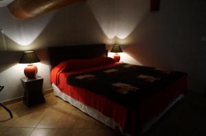 Postel nebo postele na pokoji v ubytování Hotel Le Saint Jean
