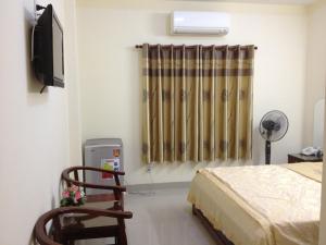 Giường trong phòng chung tại Hong Tuoi Hotel