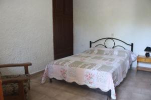 Postel nebo postele na pokoji v ubytování Madalenas B&B