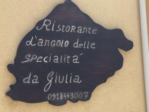 Znak, na którym jest napisane: agricoleannisannisannisanuannisannisendeanagna w obiekcie Hotel Giulia w mieście Ustica