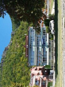 an aerial view of a building on the side of a hill at Matea Apartments in Ohrid