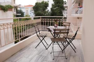A balcony or terrace at Διαμέρισμα 65 τμ στην καρδιά της πόλης