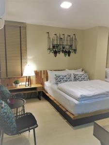 Giường trong phòng chung tại Bangkok Saran Poshtel