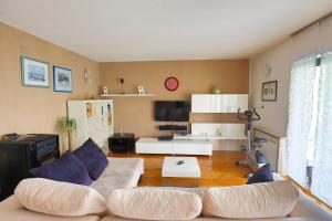 a living room with a couch and a table at Vrata Jadrana in Rijeka