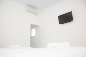 Μια τηλεόραση ή/και κέντρο ψυχαγωγίας στο Miko Bungalow Nusa Penida