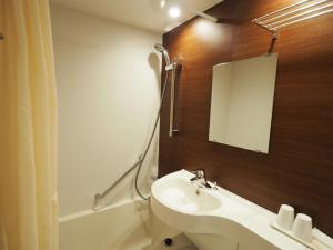 Koupelna v ubytování Haneda Inn