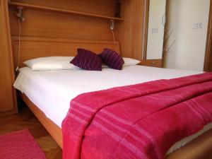 Кровать или кровати в номере Apartman Salečić