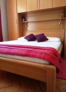 Кровать или кровати в номере Apartman Salečić