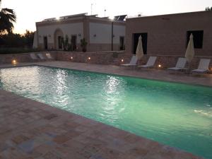 The swimming pool at or close to Masseria La Gravina
