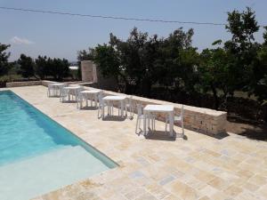The swimming pool at or close to Masseria La Gravina