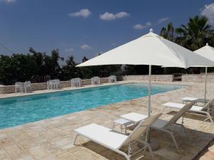 The swimming pool at or close to Masseria La Gravina