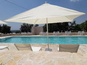 The swimming pool at or close to Masseria La Gravina