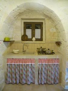 Fotografia z galérie ubytovania Trulli La collinetta v destinácii Martina Franca
