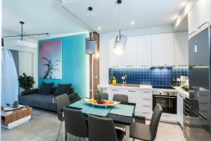 Kuchyň nebo kuchyňský kout v ubytování Mediterranean Luxury Apartment