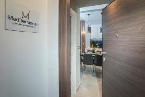 Kuchyň nebo kuchyňský kout v ubytování Mediterranean Luxury Apartment