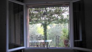 Balkón nebo terasa v ubytování Appartement en pleine nature avec piscine chauffée