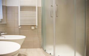 a bathroom with a shower and a toilet and a sink at L'ONDA 1 - Portovener-Fezzano in Fezzano +16 photos