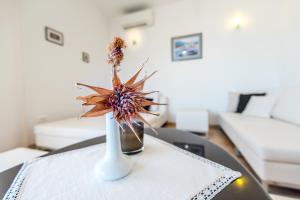 Posteľ alebo postele v izbe v ubytovaní Apartmani Gelo