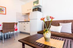 Kuchyňa alebo kuchynka v ubytovaní Apartmani Gelo