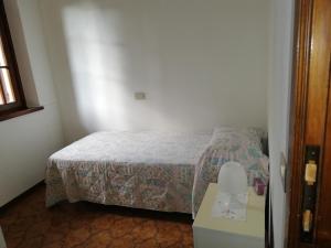 Säng eller sängar i ett rum på Casetta del Sole